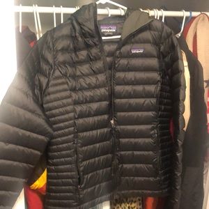Black Patagonia Micro Puff with hood.